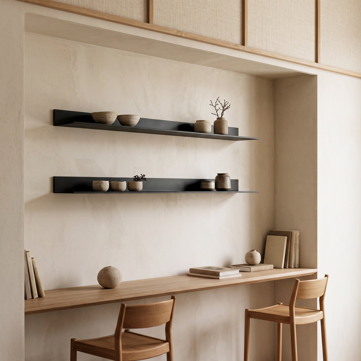Three brushed gold aluminum floating display shelves on a living room wall above a floating walnut credenza