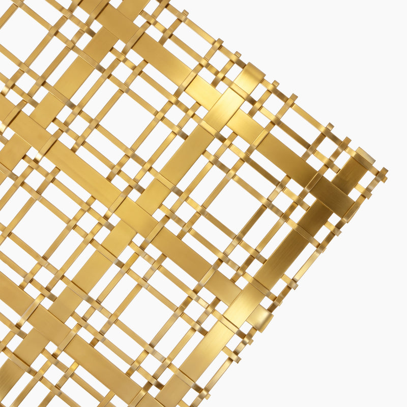 Gold-toned woven decorative metal mesh screen panel, close-up of interlocking flat metal bands and round wires